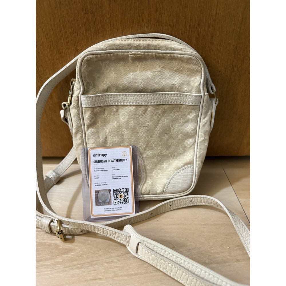 Louis Vuitton Monogram Mini Lin Danube Cream Color Ivory Fair Condition With COA